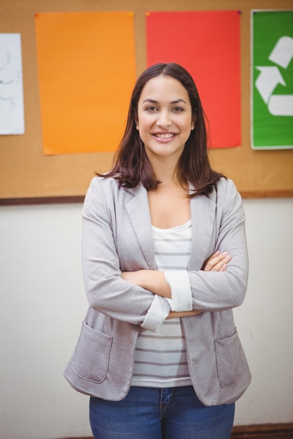 Smiling teacher looking at camera