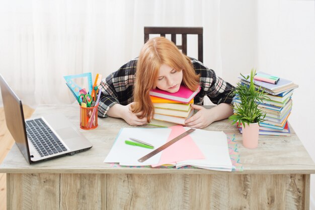 boring homework pictures Photo smiling teenager student girl doing homework at home, education and school concept