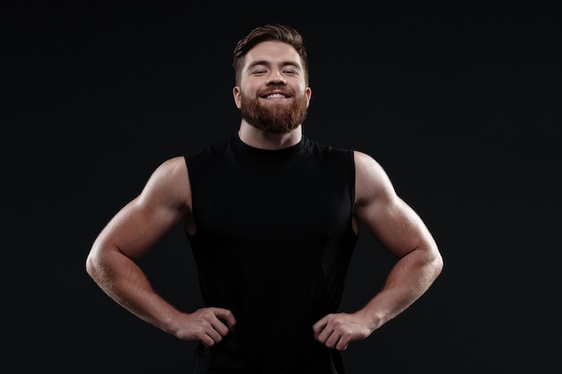 Smiling trainer in studio