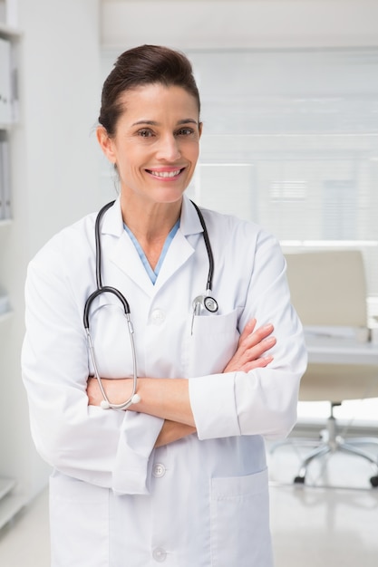 Smiling veterinarian looking at camera 