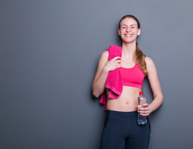 Smiling with towel and water bottle