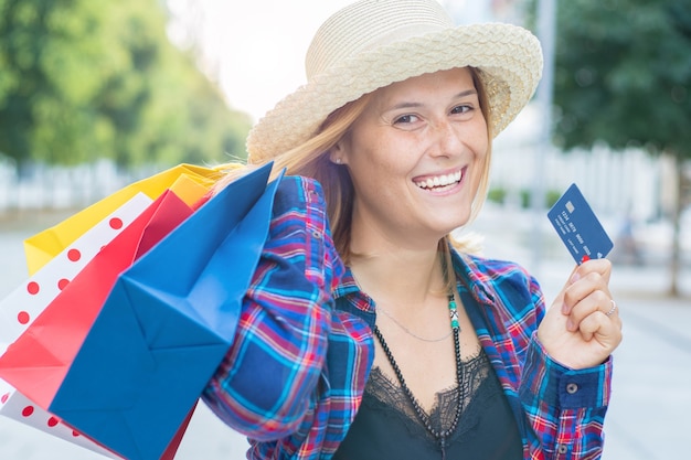 Smiling woman after doing shopping