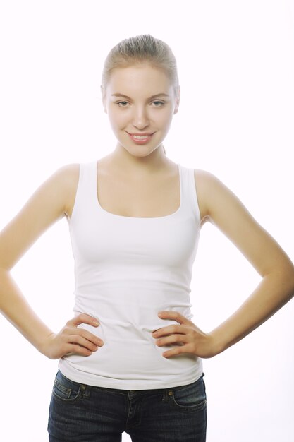 Smiling woman in blank white t-shirt isolated on white