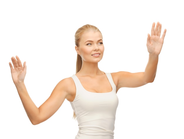 smiling woman in blank white t-shirt with raised hands