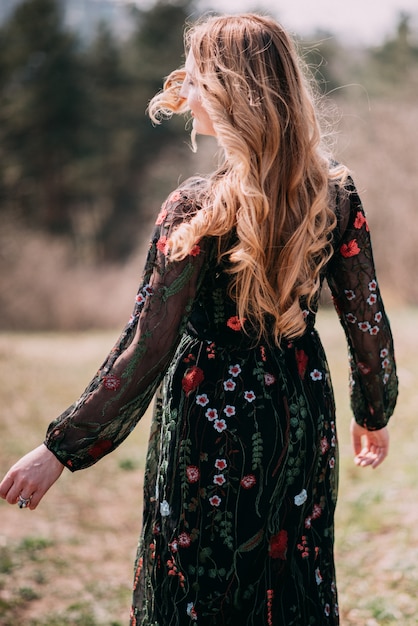 Smiling woman in the botanic garden