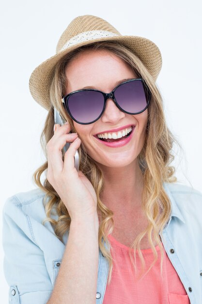 Smiling woman calling with her smartphone 