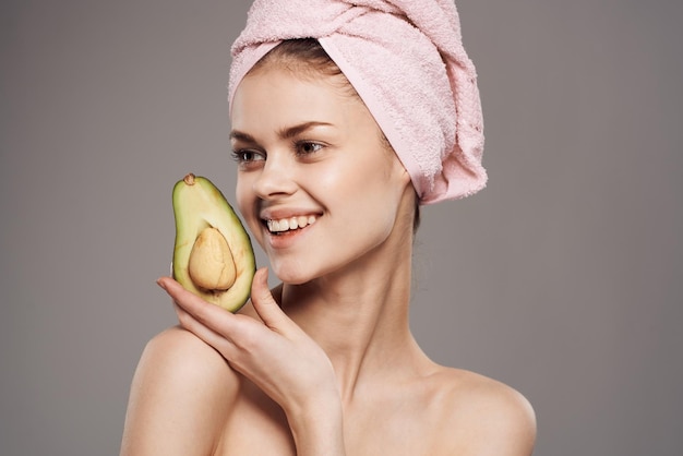 Smiling woman cropped view clean skin spa treatments cosmetics avocado