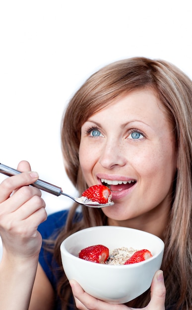 Smiling woman having a healthy breakfast 