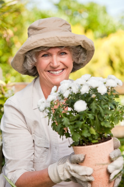 Smiling woman in her garden 