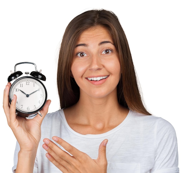 Smiling woman holding alarm watch