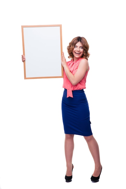 Smiling woman holding billboard