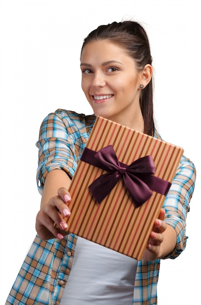 Smiling woman holding  gift box