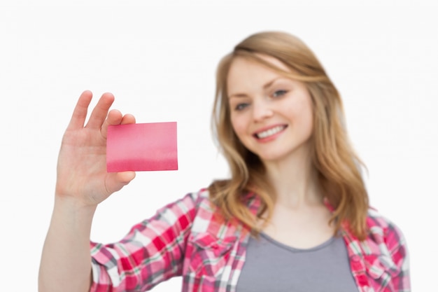 Smiling woman holding a loyalty card