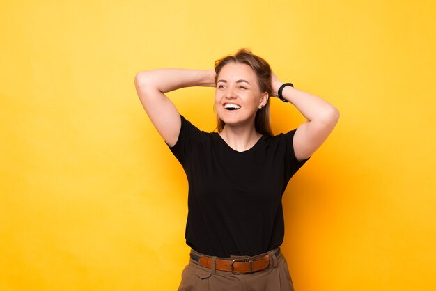 Smiling woman is experiencing excitement that she cannot believe.