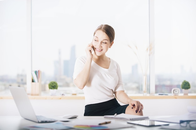 Smiling woman on phone