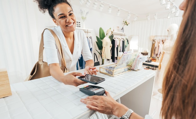 smiling woman playing at clothing store