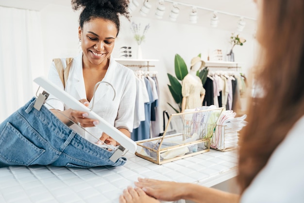 smiling woman playing at clothing store