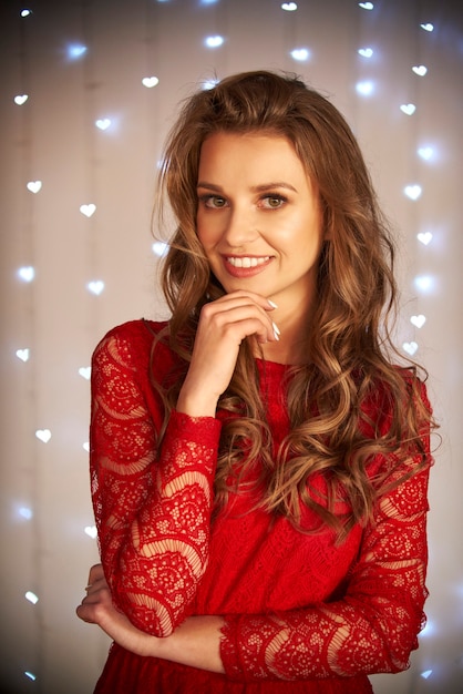 Smiling woman in red dress