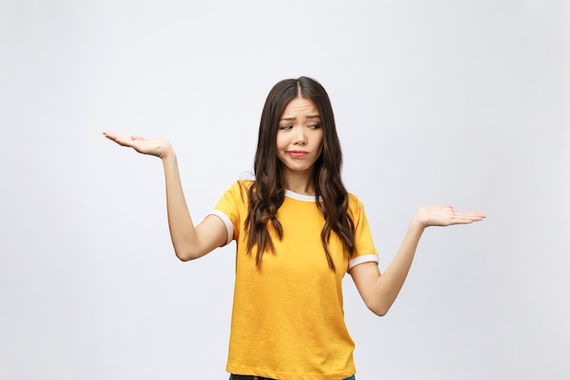 Smiling woman showing copy space for product