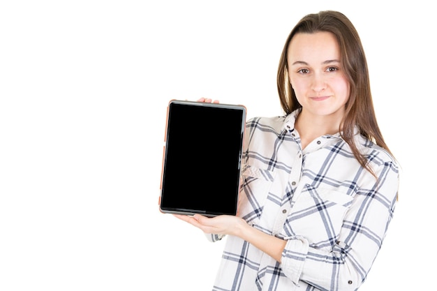 Smiling woman showing empty black tablet screen