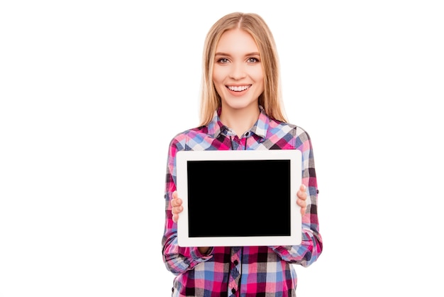 Smiling woman showing empty black tablet screen