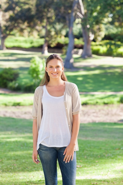 Smiling woman standing outside