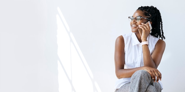 Smiling woman talking on the phone