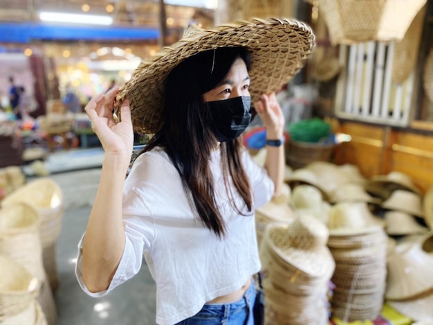 Photo smiling woman wearing hat standing at home