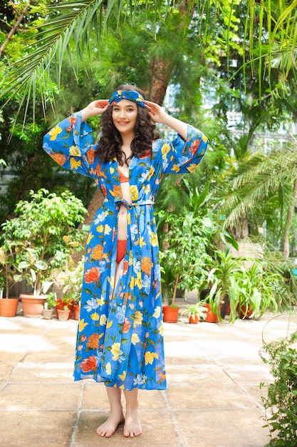 Smiling woman wearing summer clothes on resort