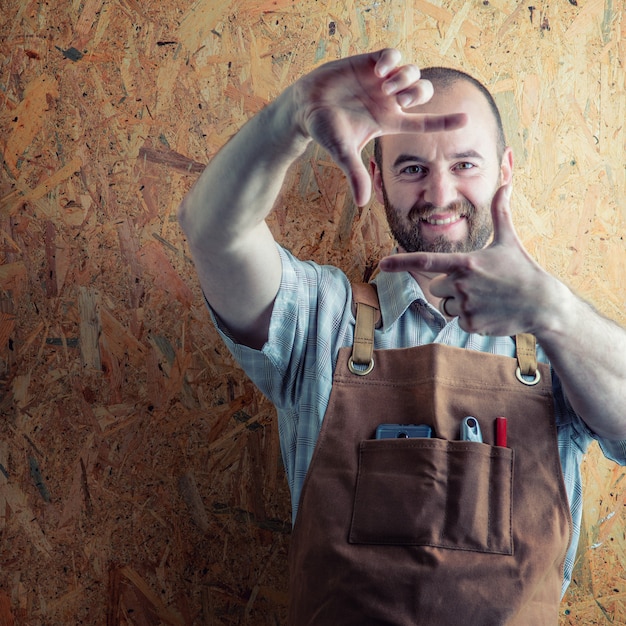 Smiling wood worker