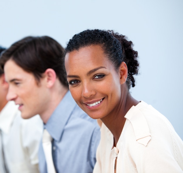 Smiling young business people at work