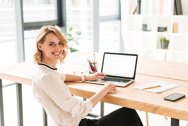 Smiling young business woman