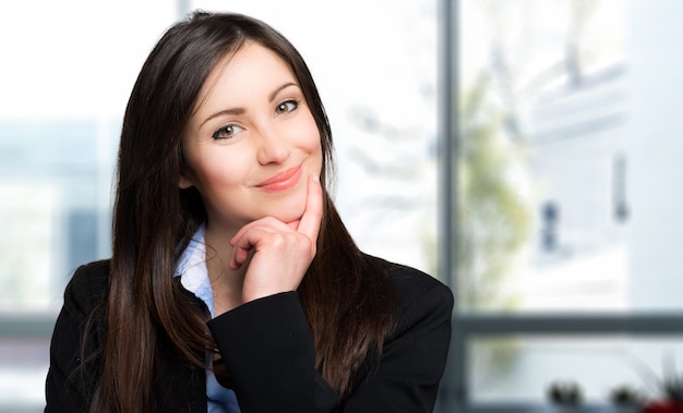 Smiling young female manager portrait