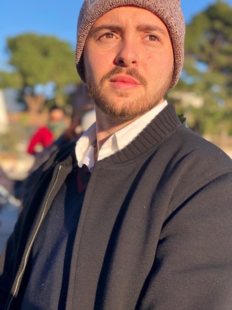 Smiling young man outdoors