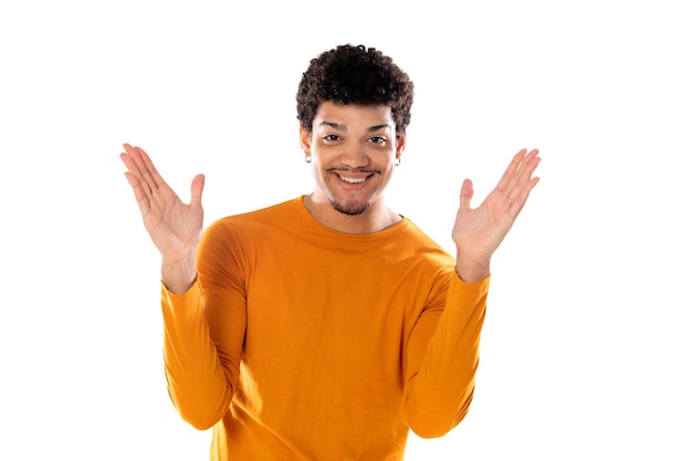 Smiling young man with afro hair wearing orange sweater isolated  