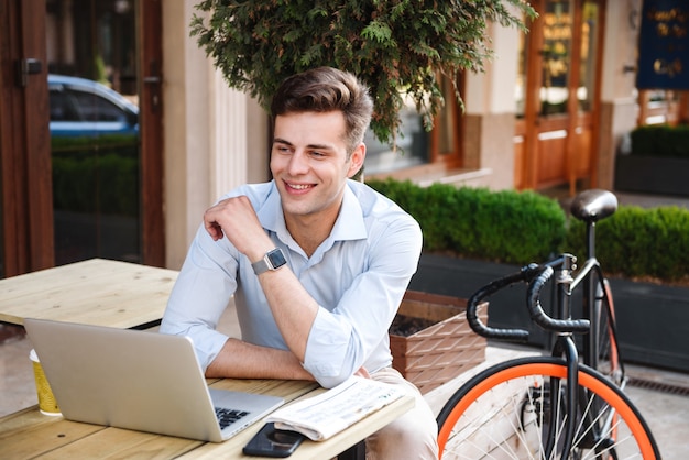 Smiling young stylish man in shirt