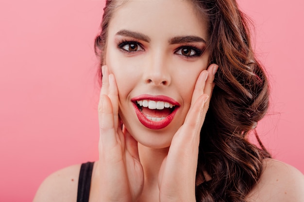 Smiling young woman in black clothes