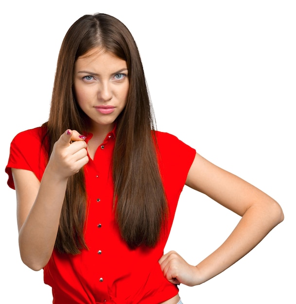 Smiling young woman pointing