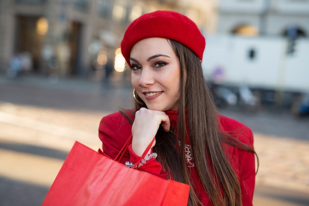 Smiling young woman shopping