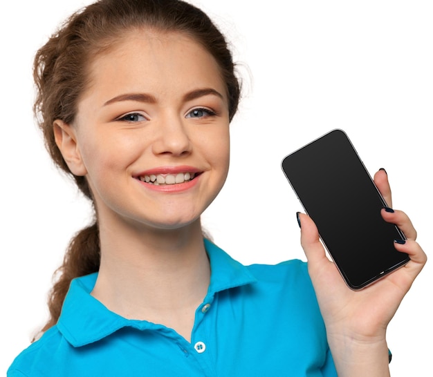 Photo smiling young woman showing blank smartphone screen