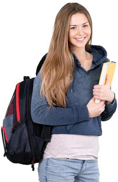 Smiling Young Woman Standing with Backpack and Book - Isolated