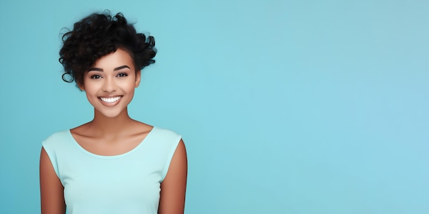 Photo smimilg young woman with dark skin and short groomed hair isolated on flat turquoise pastel background with copy space model for banner of cosmetic products beauty salon and dentistry