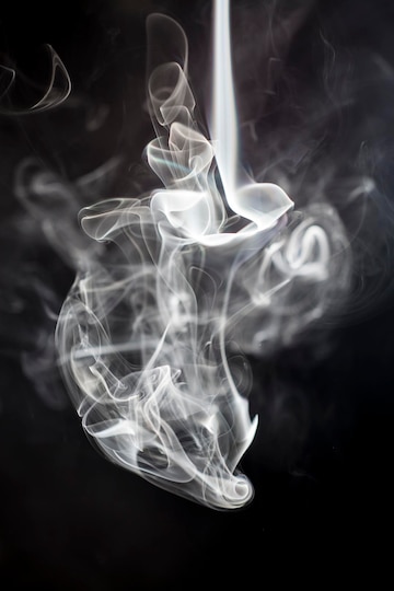 Premium Photo | Smoke on black background