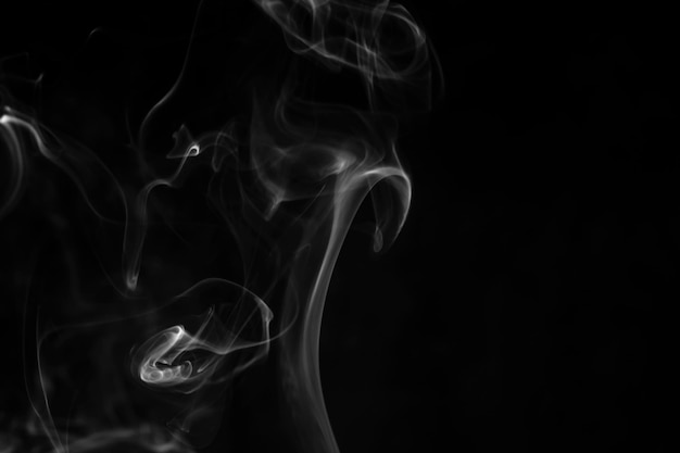 Smoke clouds on a black background