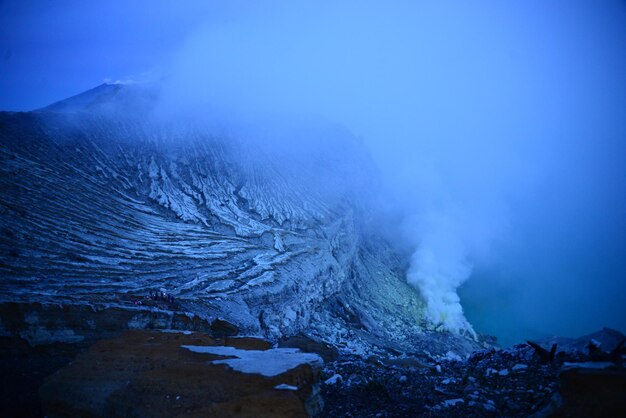 Smoke emitting from volcanic mountain