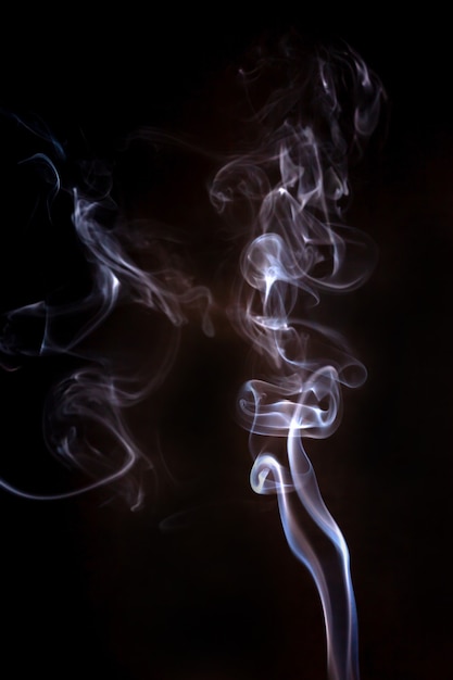 Smoke motion on black background.