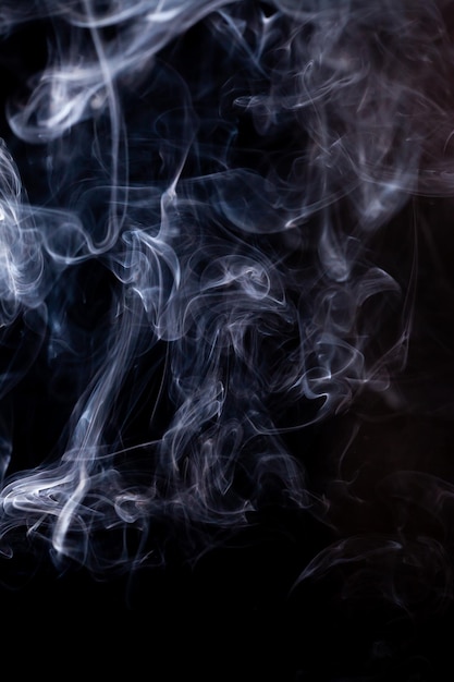 Photo smoke motion on black background