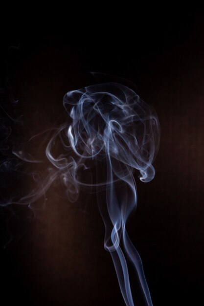 Smoke motion on black background.