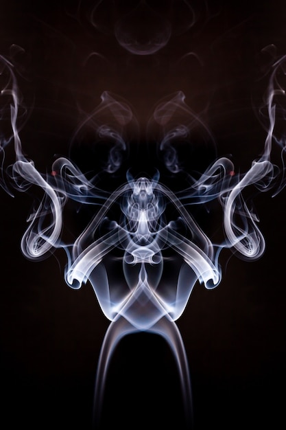 Photo smoke motion on black background.