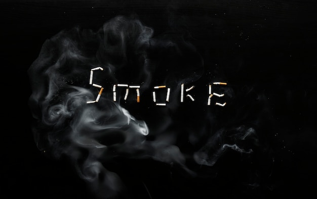 Photo smoke sign made with cigarettes